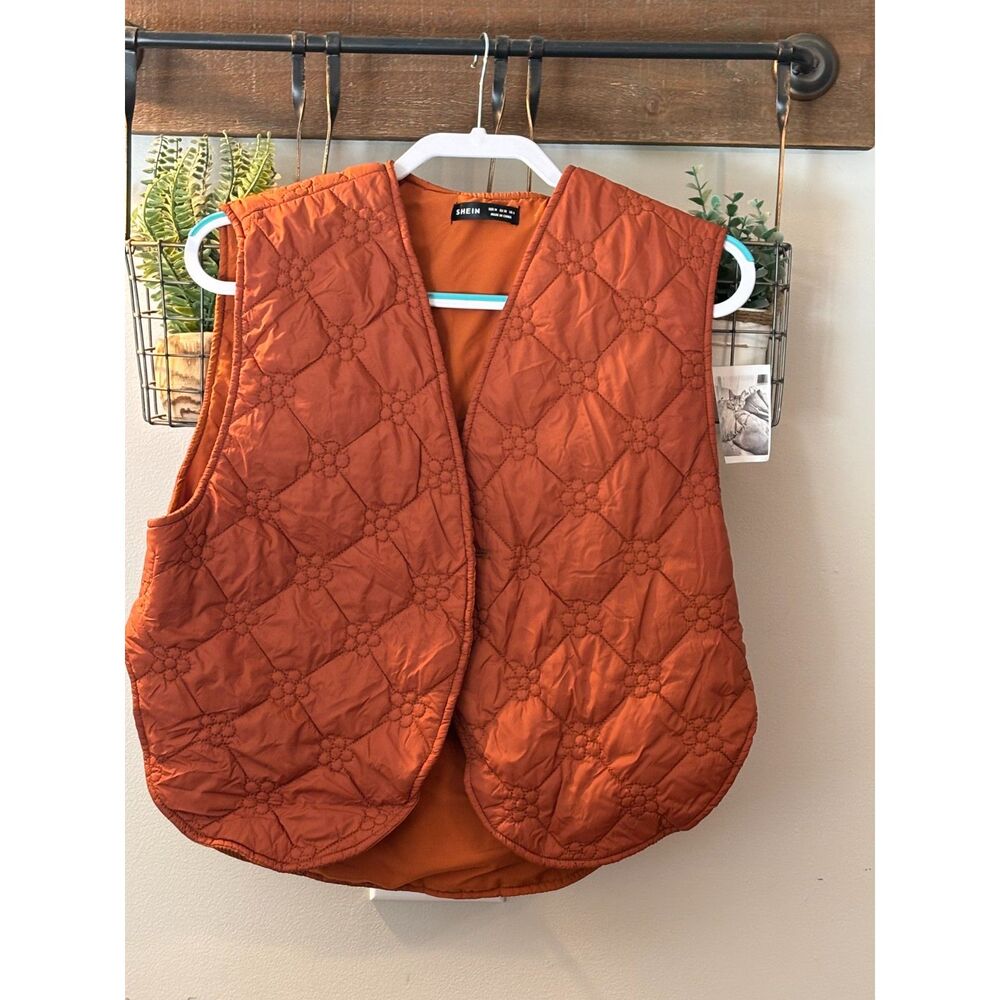 Casual light weight rusty orange quilted vest